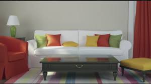 Adjust the fabric so that it falls evenly at floor level all around the chair, then press the fabric into the crevices at the arm rests and sofa back, adjusting as you go. Mass Appeal Dress Up Your Home With Diy Couch Covers Youtube