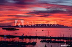 Red Sky Sunset At Kusadasi Turkey Harbour With Guvercin Adasi Island Castle On The Aegean Sea With Mountains Of Samos Greece Ad In 2020 Samos Greece Red Sky Samos