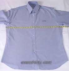 Every shirt has two length options that depend on which of the buttons you are using on the cuff. Dress Shirt Measurements Measure Shirt