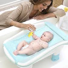 Scalds can happen in seconds if bath water is too hot. Comfy Cozy Baby Bath Tub With Towel Warmer Baby Bath Tub Baby Bath Baby Tub