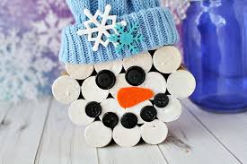 All you need is paper, paint, ribbon, and googly eyes to make one! Diy Wine Cork Snowman Crafts