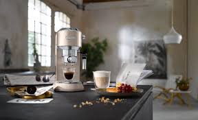 Maybe you would like to learn more about one of these? De Longhi Dedica Style Ec 685 Bk Espresso Filter Holder Espresso Machine With Professional Milk Foam Nozzle 15 Cm Wide 1 Litre Water Tank Full Metal Casing E S E Pads Beige Amazon De Home