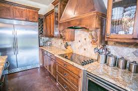 Bright and alive with color,movement. Typhoon Bordeaux Granite Natural Beauty In Your Kitchen