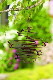 Flamed Bees Double Spiral Ornament Add Dimension And Allure In Your Garden Or On Your Patio With This Spinning Flam Metal Garden Art Spiral Garden Garden Art