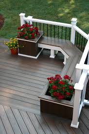 Striking elements include the timber deck curving up in a wave shape and the apple green colour of the wall behind. Deck Color Ideas That You Should See Before Working On Your Deck