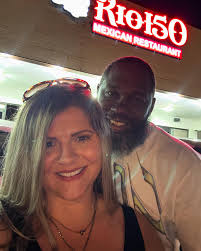 Nothing like casually meeting your daughter, her boyfriend and his family  at the Panthers game 🩵🖤 Thanks Kelly Gilbert Fleming!!!