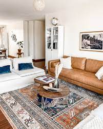 As you start browsing furniture, decorating and wall ideas for your room, think about the space's desired purpose and focus on a few staple items, such as a comfortable sofa and a coffee table, then choose the rest of the accent furniture and wall decor accordingly. Nairobi Apartment Living Room Reveal Ijeoma Kola