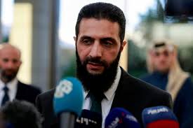 Former Syrian rebel leader named interim president