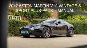 Image result for Marron Black 2017 Aston Martin