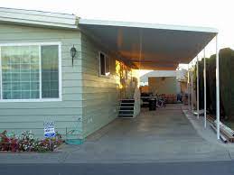 The fence uses a guide and stop and the cabinets have tons of storage. Mobile Home Patio Covers Superior Awning