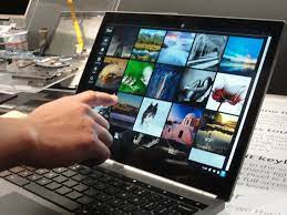 Position yourself in front of the camera and tap the grey shutter icon to take a picture. How To Take A Picture On A Chromebook And Find It Later