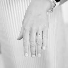 S tattoo on ring finger. Minimalist Letter S Tattoo On The Finger
