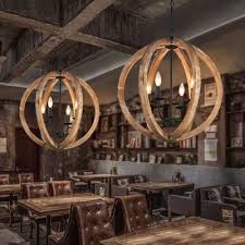 When it comes to decorating spaces dominated by rustic or industrial decor. Candle Dining Room Chandelier With Globe Shade Metal And Wood 4 Lights Rustic Style Pendant Light Beautifulhalo Com