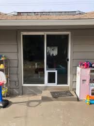 Pull the sliding glass door open with the handle. Pet Doors Installation Southgate Glass