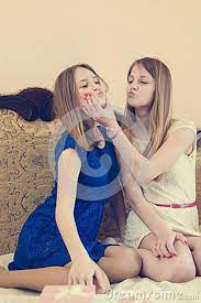 At the age of 45, i feel i have been through quite a lot: 2 Beautiful Blond Young Woman Sisters Or Best Pretty Girlfriends Having Fun In Bed Teasing Each Other Happy Smiling Relaxing Stock Photo 42356246 Megapixl
