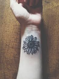 Cool black and white daisy tattoos. 23 Pretty Daisy Flower Tattoos For Wrist