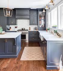 White subway tile backsplash countertops and white cabinets with navy blue colored island. Navy Colored Cabinets For Kitchens By Kountry Kraft Inc