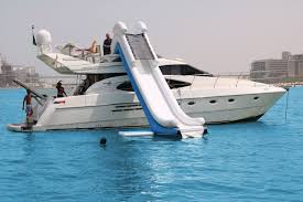 Rent A Private Yacht Charter With A Water Slide In Dubai Charter This Yacht And Cruise Along Dubai S Coastline To B Sailboat Rental Boat Rental Yacht Charter
