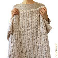 The crochet cable blanket pattern is full of beautiful texture and is easier than it looks! Easy As Pie Crochet Blanket Pattern