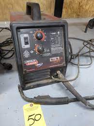 The machine power switch should be turned to the off (o) position before working inside the wire. Lincoln Weld Pak 3200hd Wirefeed Welder