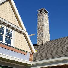 This gas fire doesn't need a chimney. We Re Loving How The Chimneys Turned Out On Our Shingle Style Build The Stone Is A Tumbled Limestone And The C Shingle Style Installing Shingles Exterior Trim