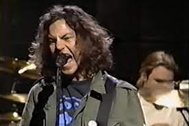 He is a musician, singer and songwriter best known as a member of the rock band pearl jam, with whom he performs lead vocals and is one of three guitarists. 25 Years Ago Eddie Vedder Slams Music Industry In Not For You