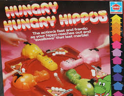 Pick your hippo, release the marbles, then race to eat the most marbles to win! Hungry Hungry Hippos Game Box Fonts In Use