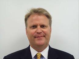 Huntley executive helps museum go under wraps