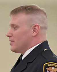 Three police officers take the oath