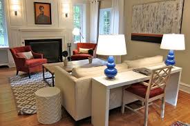 Could We Rearrange Our Couch Living Room To Look This Way Love The Table Behind The Couch Desk In Living Room Livingroom Layout Trendy Living Rooms