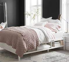 You can notice the white drawers under it. Clara Storage Platform Bed Pottery Barn