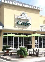 The Secret Garden In Jacksonville Florida I Have Travelled 620 Miles To Get The Banana Cake You Can T Miss With Anything On Garden Cafe Secret Garden Cafe