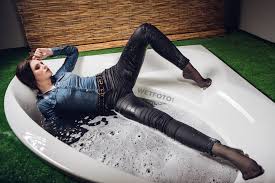 May 3 at 12:58 pm ·. Brunette Girl In Tight Jeans Overall And Jacket Gets Completely Wet In Bath Wetfoto Com