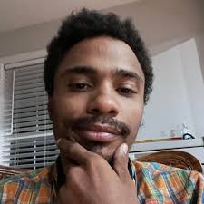 Help me name my snow person! I'm thinking "Bruno" or "Snake Eyes".