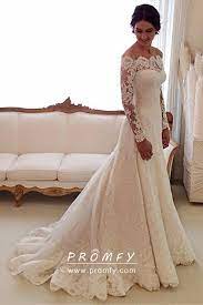 Check out this ivory lace long sleeve wedding dress and see more inspirational photos on theknot.com. Off Shoulder Long Sleeve Ivory Lace Wedding Dress Long Sleeve Bridal Gown Wedding Dress Long Sleeve Long Wedding Dresses