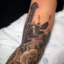 The sword symbolizes solidarity, protection, honor, inner strength, force, justice, courage, leadership, aggression, and chivalry. 50 Sword Tattoos For Men A Sharp Sense Of Sophistication