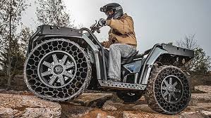 Polaris Atv Gets Novel Non Pneumatic Tires See It In Action Here Http Aol It 18edqxn Polaris Atv Atv All Terrain Vehicles