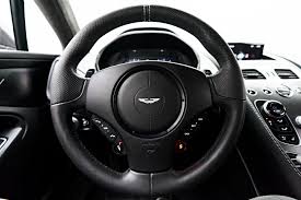 Image result for Carbon Black 2014 Aston Martin