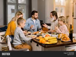 When you picture an idyllic thanksgiving dinner, what do you see? Family Kids Eating Image Photo Free Trial Bigstock