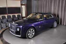 13 Million Rolls Royce Sweptail Drops By Abu Dhabi Showroom For Photo Op Carscoops Rolls Royce Models Rolls Royce Royce