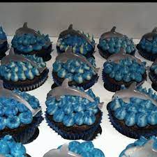 Give each cupcake a quick spread of bright frosting, divide the candies into small bowls and let little hands create monster faces. 16 Dolphin Cupcakes Ideas Dolphin Cupcakes Dolphin Cakes Cupcake Cakes