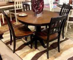 Owingsville Dining Table The Rich Cottage Beauty Of The Owingsville Dining Collection Uses A Rich M Furniture Dining Table Dining Table Dining Table Setting