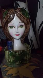 Lipstick Holders varying from the 1900s up to 1970