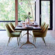 The deco dining chairs design is made from a solid white oak frame and a comfortable polyester seat. With A New Year Starting And Lots Of Fresh Ideas And Trends Already Surfacing The Web Today We Are Sho Trestle Dining Tables Luxury Dining Modern Dining Table