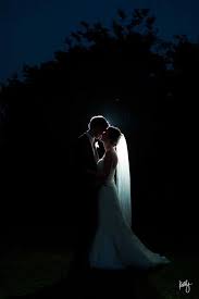 The first thing to do when starting out in nighttime photography is to practice. Backlit Night Wedding Shot Night Wedding Photos Wedding Photo Collage Romantic Night Wedding