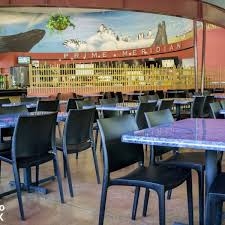 Vibrant Cultured Marble Table Tops Are Paired With Black Resin Chairs In The Prime Meridian Cafe At The Dall Restaurant Table Tops Table Tops Restaurant Tables