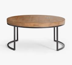 Display a loved one's picture or a table lamp on this side table to beautifully fill that void beside your bed. Malcolm Round Nesting Coffee Tables Pottery Barn