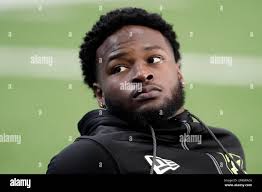 North Carolina running back Javonte Williams participates in the school's  Pro Day football workout for NFL scouts in Chapel Hill, N.C., Monday, March  29, 2021. (AP Photo/Gerry Broome Stock Photo