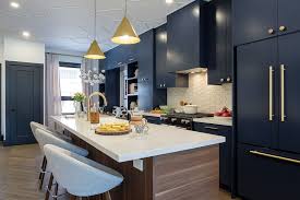 Bright Blue Kitchen Design With Brass Accents Property Brothers Kitchen Property Brothers Property Brothers Designs