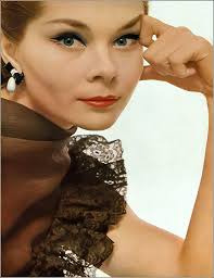 Model Kathleen Wallace (center) and two other models wearing slim linen  sheath dress's and page-boy or brushed under bob hairdos, New York City.  Photograph by Nina Leen, 1950. Source. Word Press